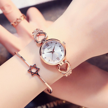 金米欧新品手表女镶钻镂空简约手链表时尚潮流时装学生手表石英表
